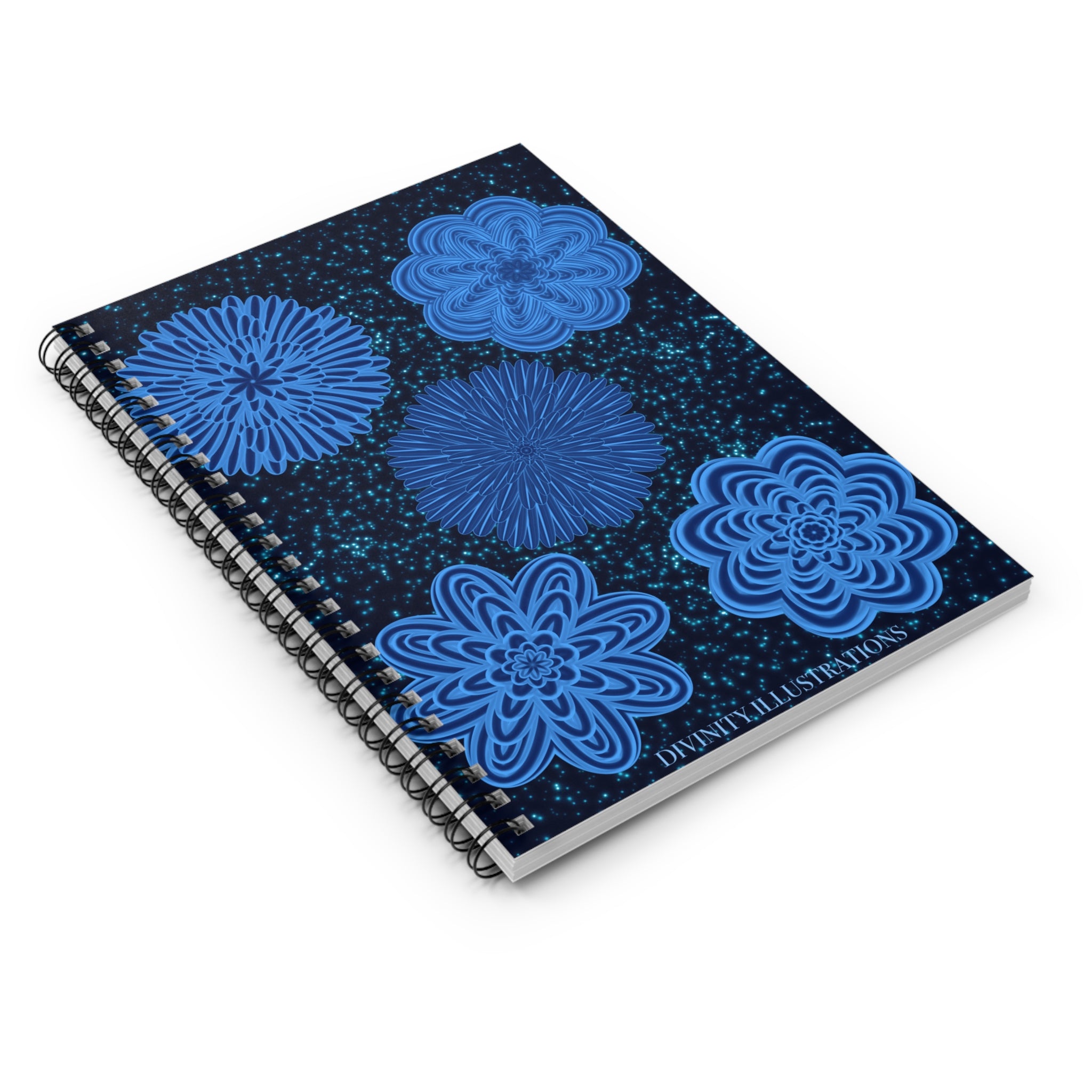 Notebook with blue floral designs on a black speckled background