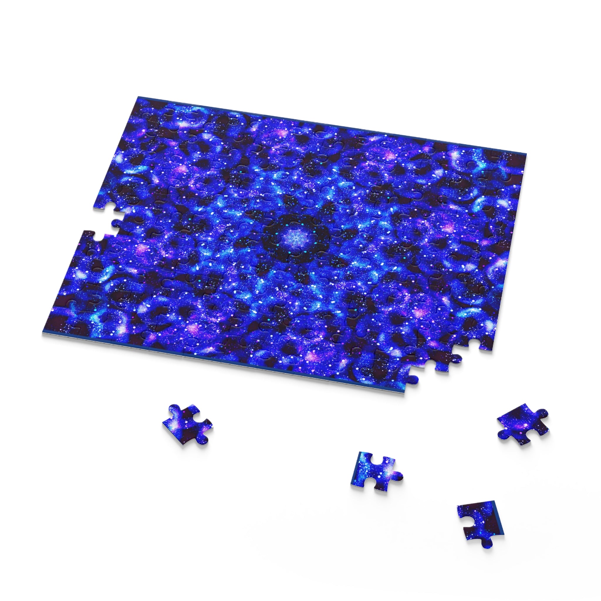 Jigsaw puzzle with a galaxy-themed design on a white background
