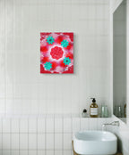 red and teal floral art print displaued in a luxury bathroom