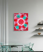 red and teal floral art print displayed in a luxury dining room setting